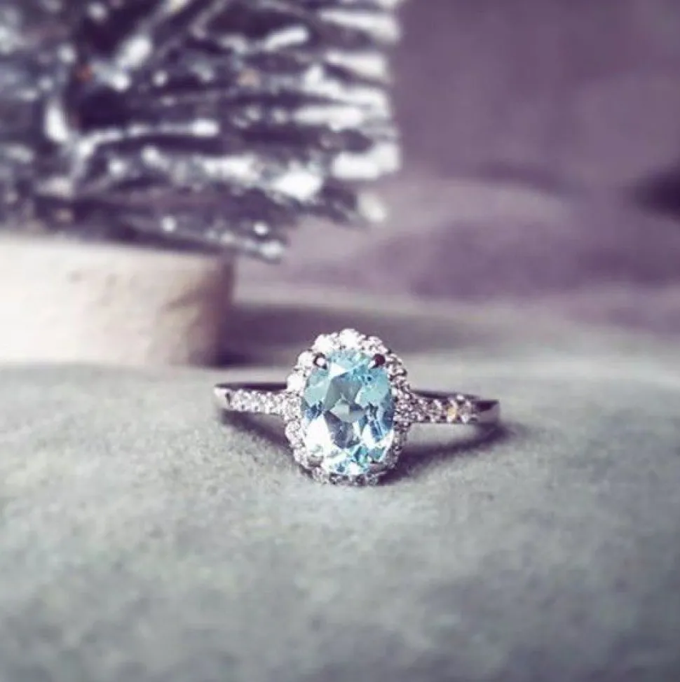 ring_witgoud_topaas__bril_3.webp Ring witgoud topaas + briljant